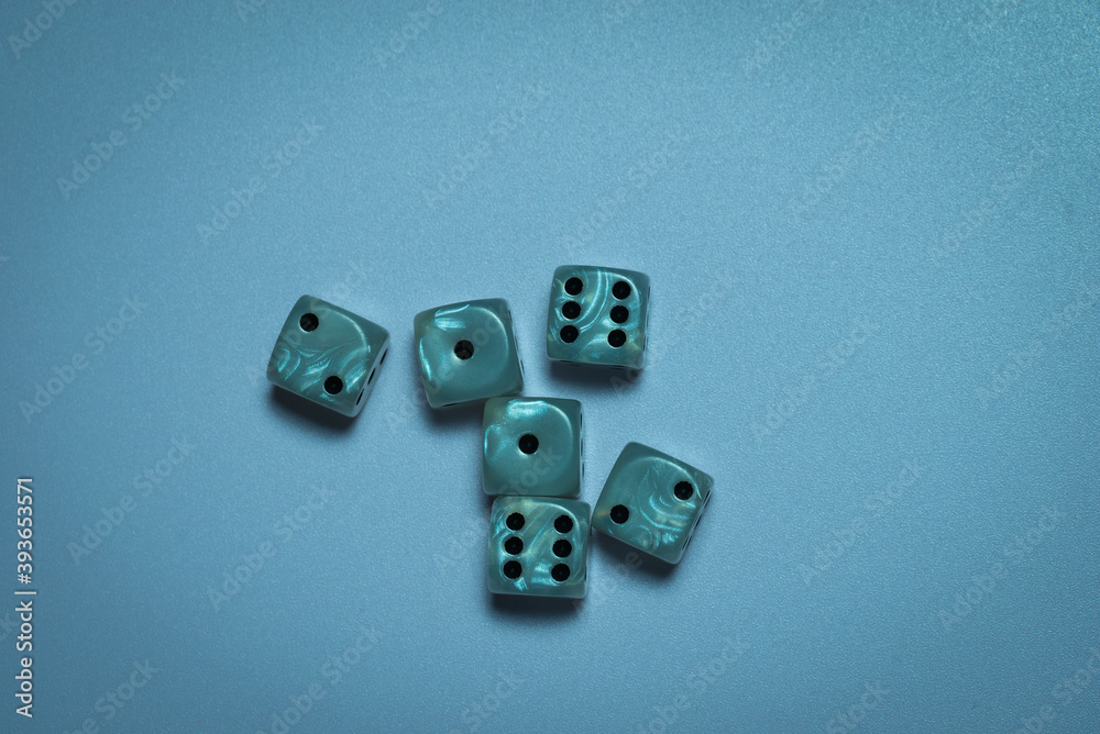 six dice indicate random numbers on a light background six dice indicate random numbers on a light background