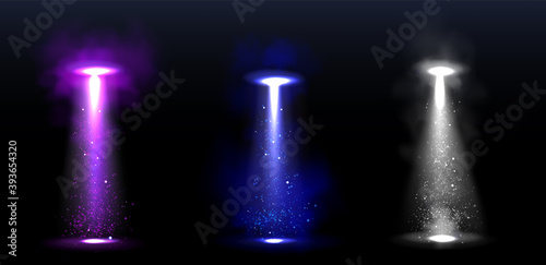 Ufo light beams, glowing rays from alien spaceships. Vector realistic set of spotlight effect of flying saucer illuminated fog and particles. Spacecraft glow beams at night
