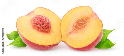 Isolated halved peach. Fresh peach fruit cut in half isolated on white background
