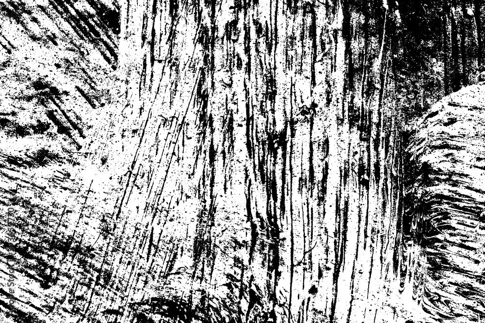 Fototapeta premium Black and white grunge texture. Black streaks of paint, ink, and dirt. Abstract monochrome background. Pattern of scratches, chips, and wear