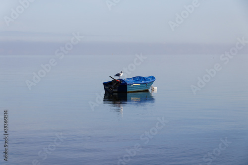 fishing boat on the lake © MarekLuthardt
