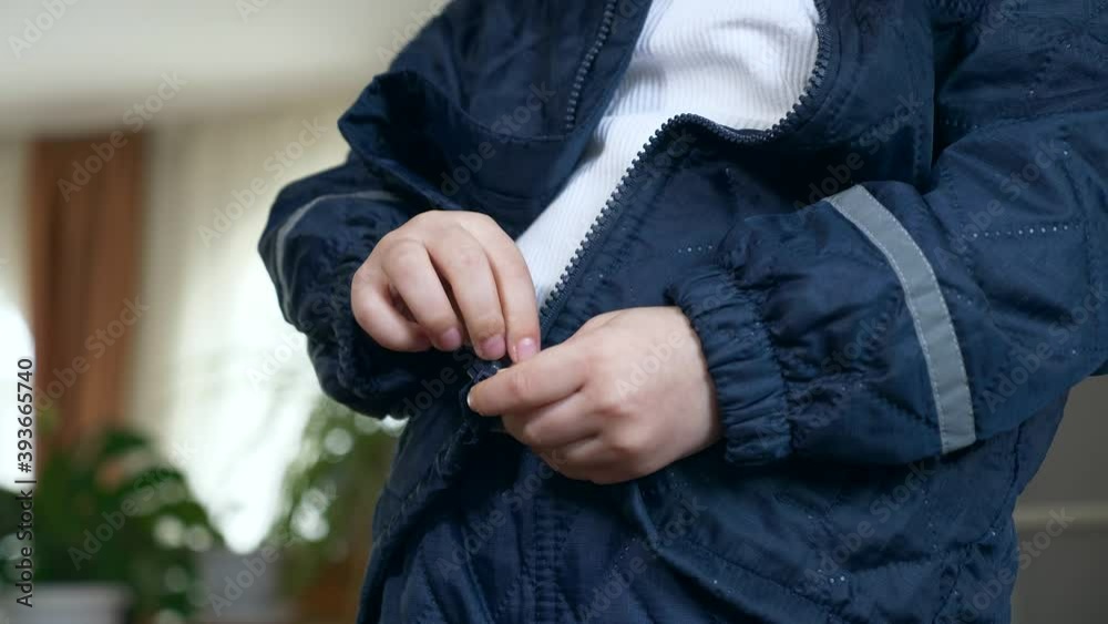 Child Zipping Fastens his Jacket with a Zipper. Little Boy Wearing Winter Attire Zipping with Zip-fastener. 2x Slow motion 60 fps 4K Child Zipping Fastens his Jacket with a Zipper. Little Boy Wearing Winter Attire Zipping with Zip-fastener. 2x Slow motion 60 fps 4K