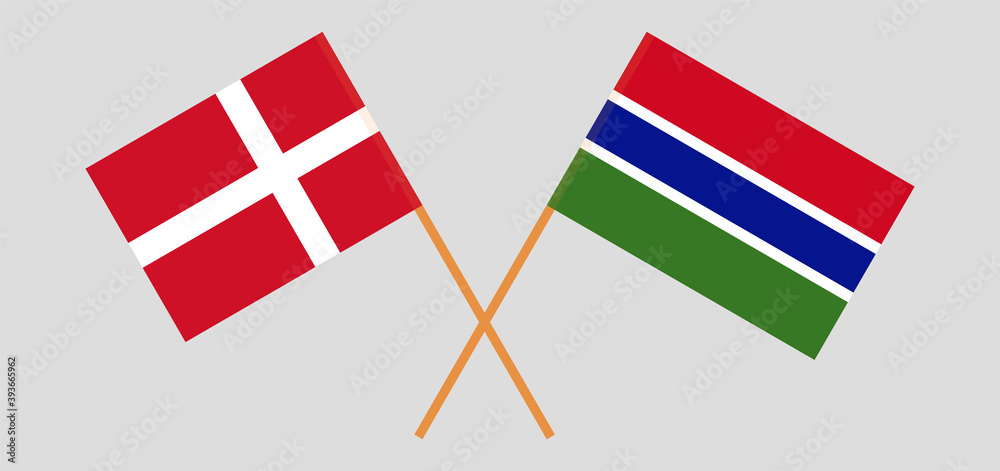Crossed flags of Gambia and Denmark.
