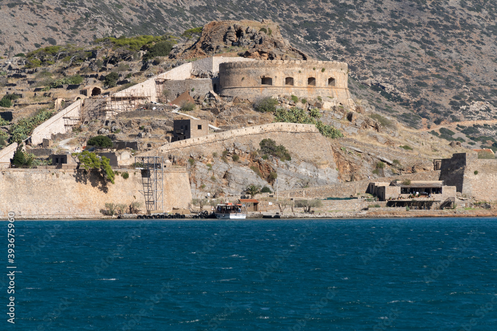 Ruins of the venetian fortress on the island of Spinalonga, Gulf of Elounda, Lasithi, Crete, Greece. It was used as a leper colony from 1903 to 1957