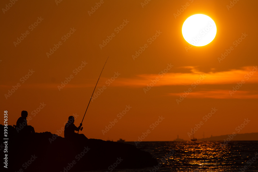 pescador Playa de Palma atardecer