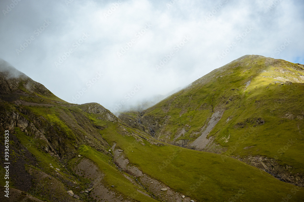 Foggy mountains after rainy night