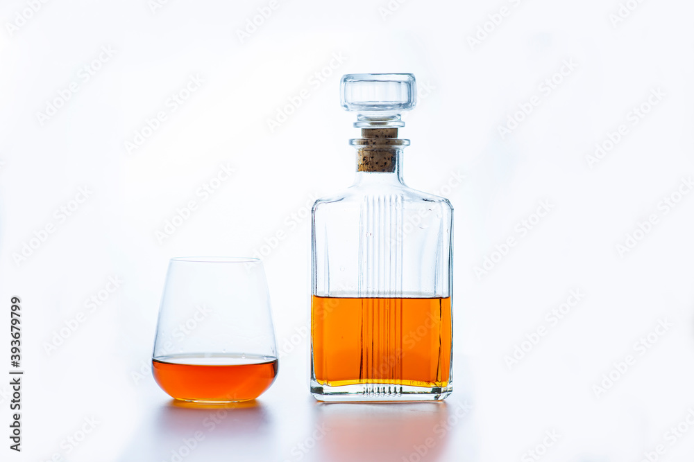 bottle and glass of whiskey on white background bottle and glass of whiskey on white background