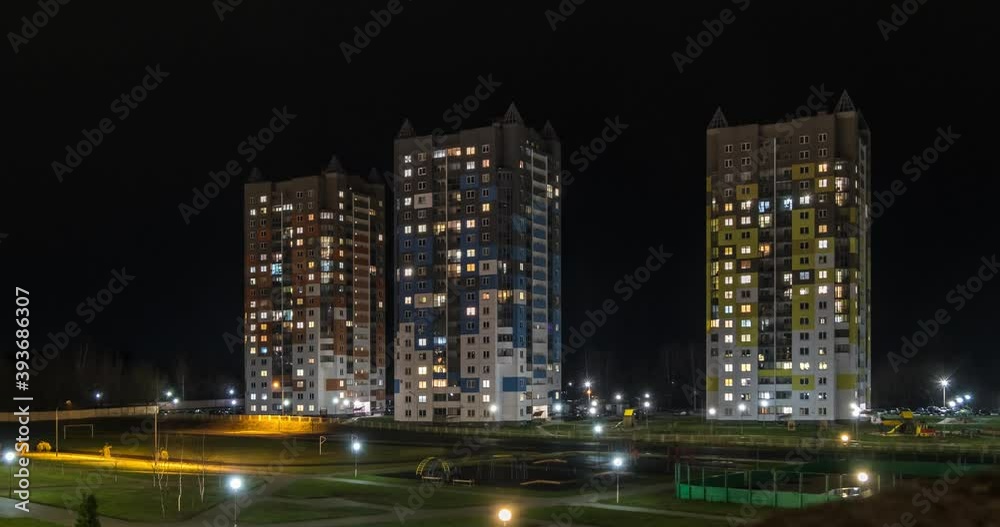 moving of night time lapse of Light in the windows of a multistory buildings. life in a big city. Serenade of light moving of night time lapse of Light in the windows of a multistory buildings. life in a big city. Serenade of light
