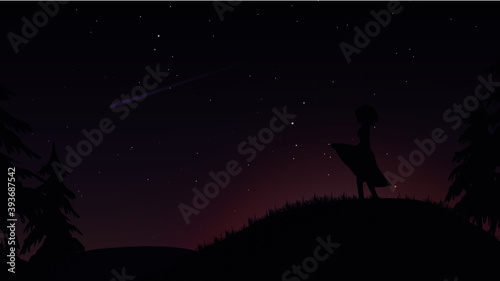 silhouette of a person standing watching the sky
