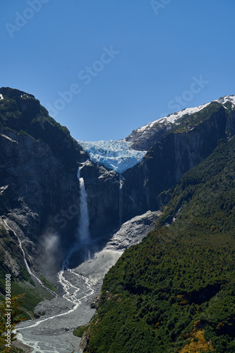 Sunset of Ventisquero Colgante  a hanging Glacier with waterfall and lake in queulat national park along the carretera austral in Patagonia  Chile  South America