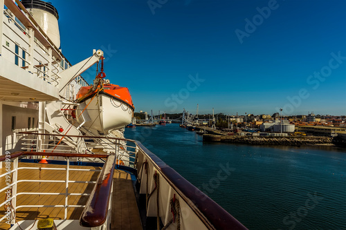 Reversing into a berth in the port of Leixoes, near to Porto, Portugal in the early morning light photo