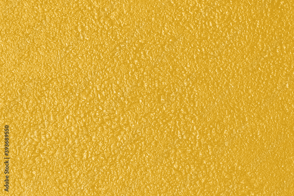 Abstract background. Texture toned in trendy color of 2021 Fortuna Gold Abstract background. Texture toned in trendy color of 2021 Fortuna Gold