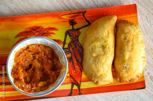 African fry food with tomato sauce photo