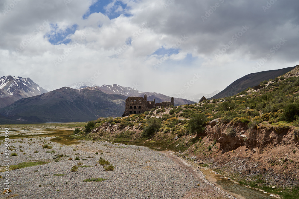 Old abandoned ruins of Hotel at the Termas del Sosneado in the andean Mountains of Argentina, South America. 
