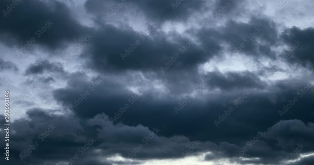 Time-lapse Evening Grey Cumulus Clouds Moving Fast on Blue Sky. Weather Climate. Autumn Winter Spring Season Time-lapse Evening Grey Cumulus Clouds Moving Fast on Blue Sky. Weather Climate. Autumn Winter Spring Season