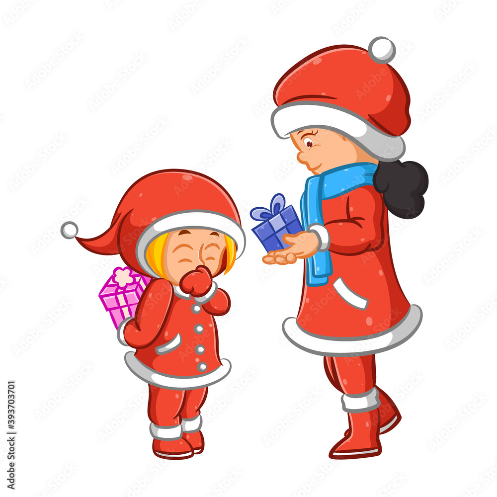 The mother giving the gift for her daughter for the Christmas day
The mother giving the gift for her daughter for the Christmas day