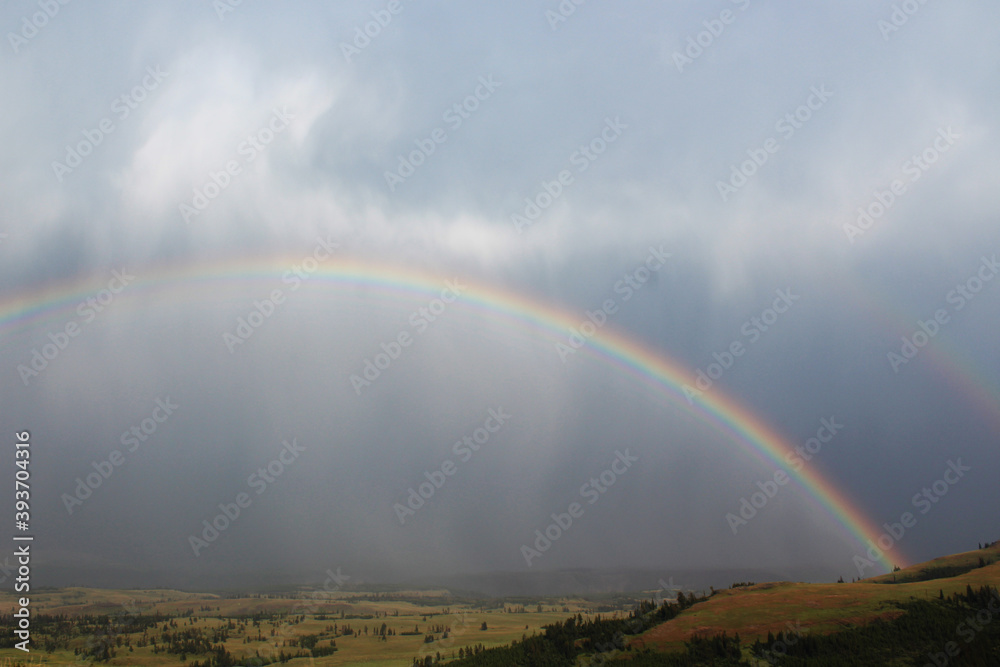 A rainbow in Yellowstone National Park, Wyoming, USA. A rainbow in Yellowstone National Park, Wyoming, USA.