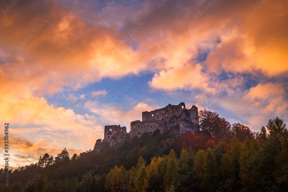 Fall landscape at sunset. The medieval castle Lietava nearby Zilina town, Slovakia, Europe.