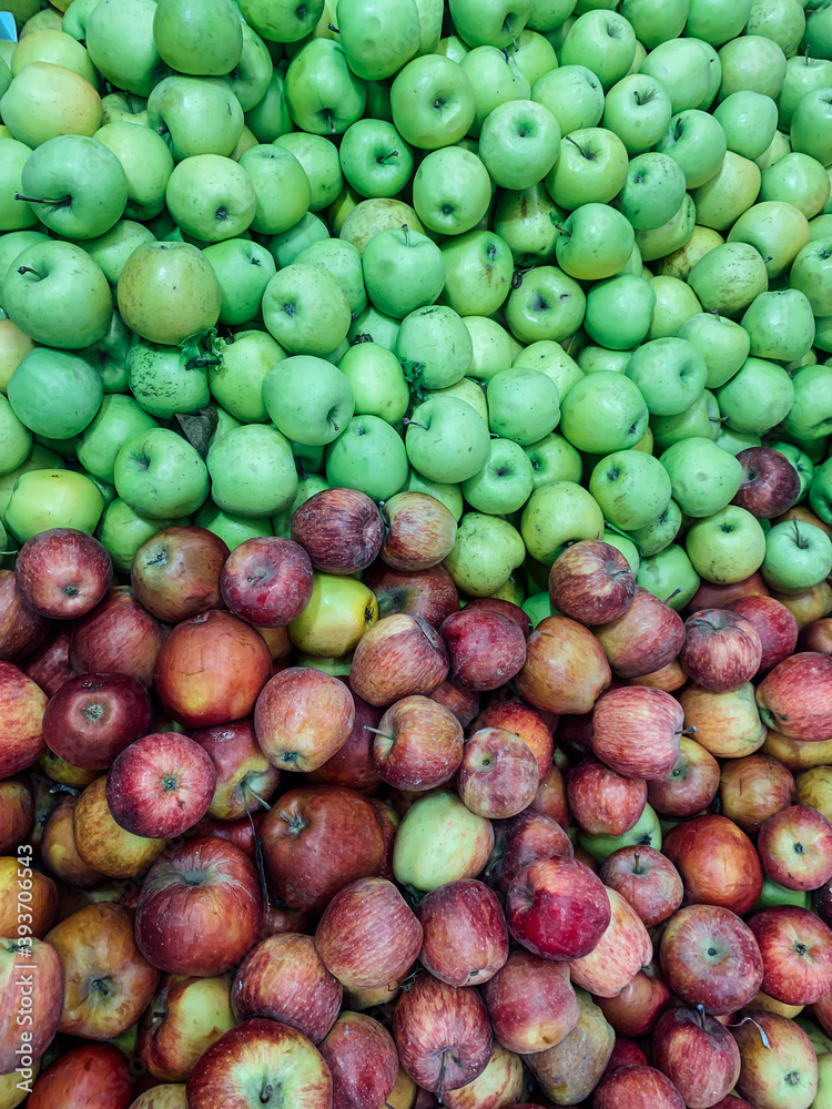 lots of ripe fruit sweet apples for cooking as a background