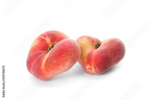 Fresh ripe donut peaches on white background