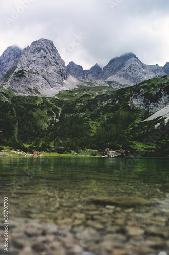 Experience the breathtaking beauty of the high alpine mountain landscape of the Zugspitze area in the Alps, with its stunning peaks and tranquil atmosphere. Perfect for outdoor activities and nature
