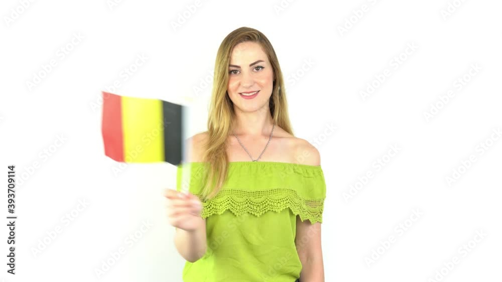 blonde woman waving germany flag in front of white background  