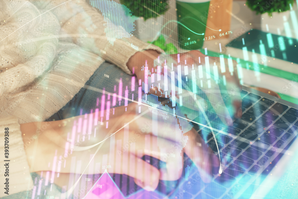 Double exposure of woman hands typing on computer and forex chart hologram drawing. Stock market invest concept. Double exposure of woman hands typing on computer and forex chart hologram drawing. Stock market invest concept.