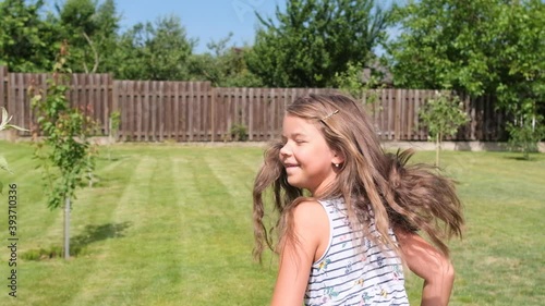 Girl playing catch-up. Running away from the camera.