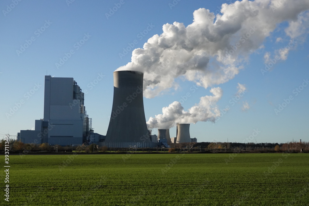Coal-fired power station in Neurath, which generates steam from cooling towers