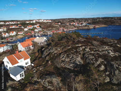 Experience the serene beauty of Sweden's archipelago coast with its iconic red wooden houses, chilly sea and tranquil atmosphere. Perfect for tourism and travel