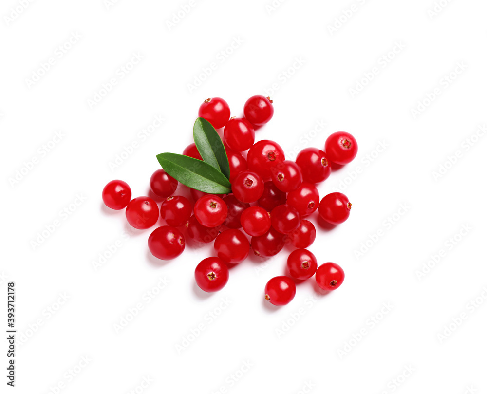 Pile of fresh cranberries with green leaves on white background, top view Pile of fresh cranberries with green leaves on white background, top view