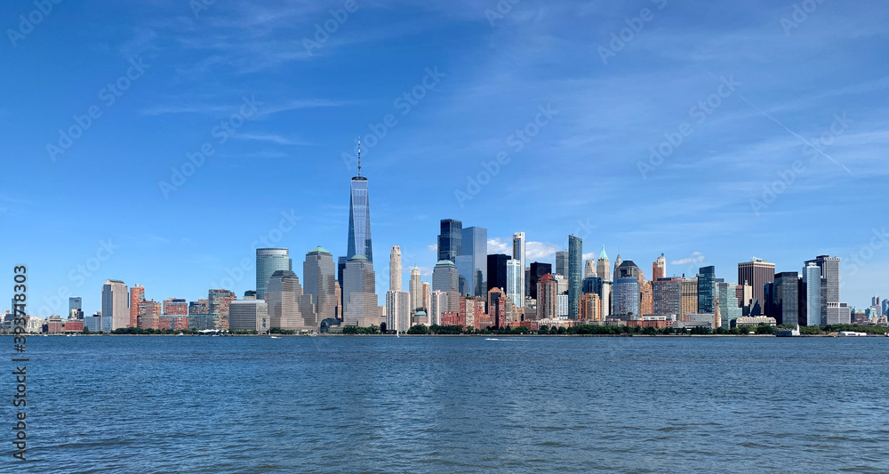 View of Manhattan, New York. Downtown Manhattan on a clear day against the blue sky