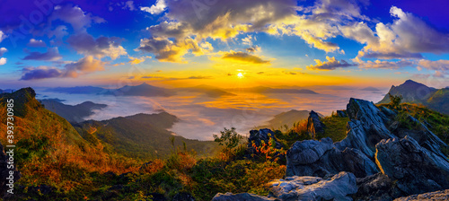 Vászonkép Panorama Sunrise and misty at Doi Phatang viewpoint, Chiangrai province, Thailand