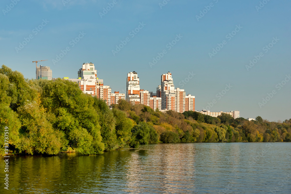 Moscow, Russia - September 24, 2020: Park on the embankment of the Moskva river. View of the Strogino area