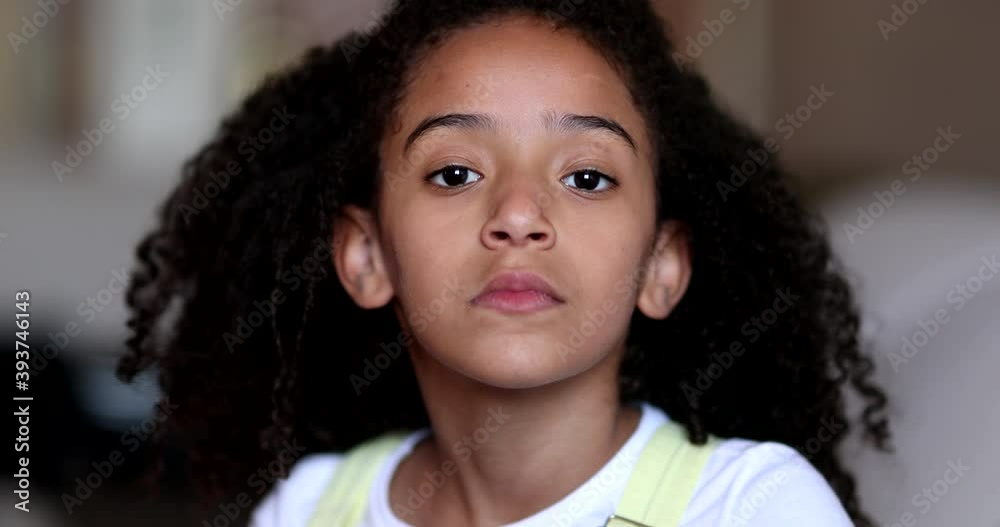 custom made wallpaper toronto digitalFemale mixed race child girl staring camera. Serious little kid