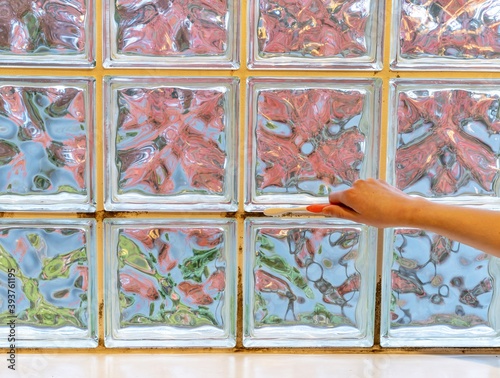 Wallpaper Mural Hand cleaning black mould from window grout Torontodigital.ca