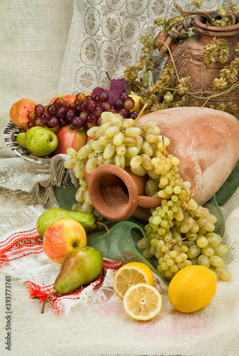 Old Ceramic Vases And Fruits