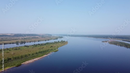 Wallpaper Mural Top view of a wide full-flowing river with islands. Summer sunny day. Aerial photography Torontodigital.ca