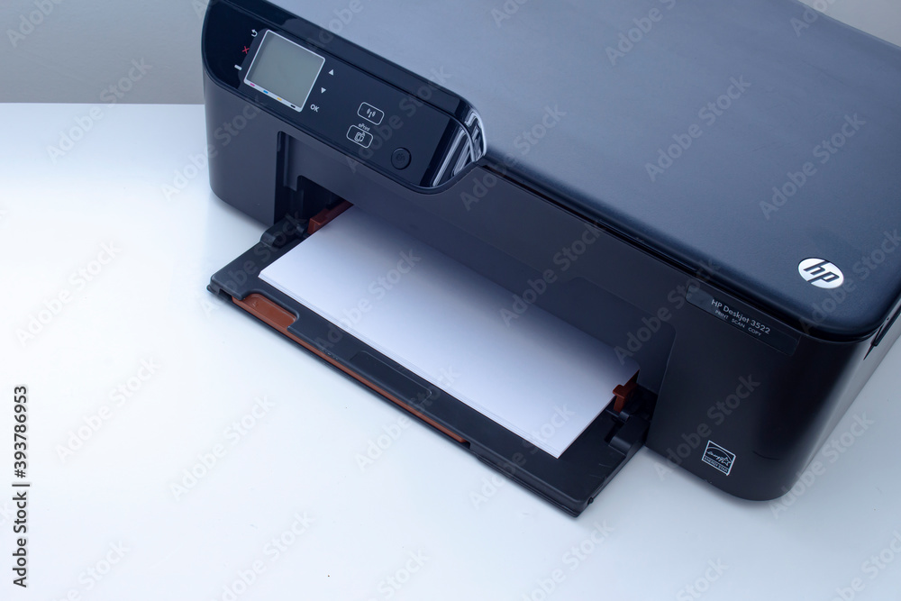 Calgary, Alberta, Canada. Nov. 19, 2020. An HP Deskjet 3522 e-All-in-One  Printer on a white table.. Stock Photo | Adobe Stock