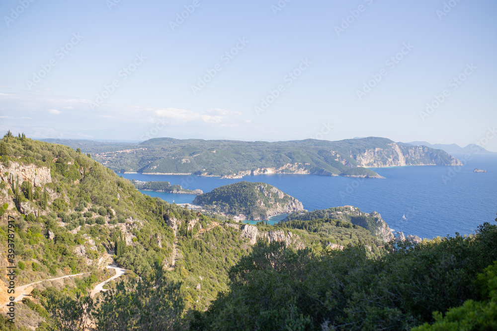 Top view of hilly mountains and sea