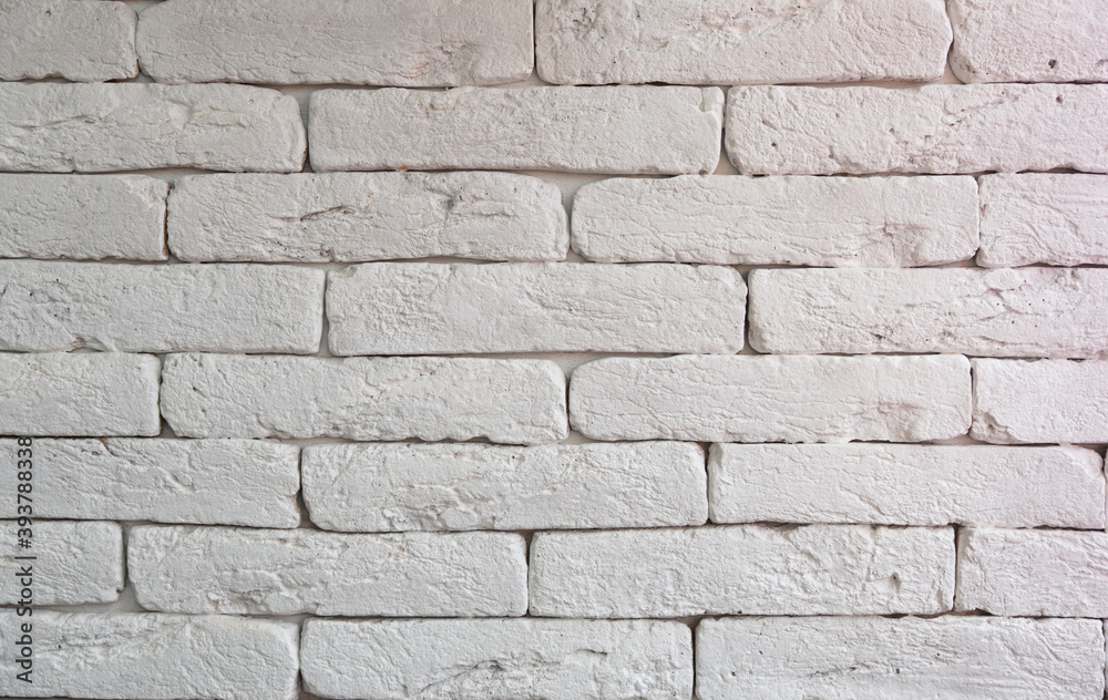 The surface texture of the retro red brick wal with grey concrete in the gaps. The surface texture of the retro red brick wal with grey concrete in the gaps.
