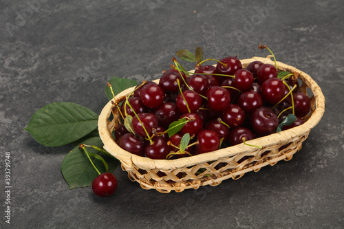 Sweet ripe cherry with leaves