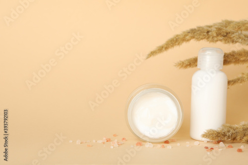 Concept of skincare cosmetics on beige background