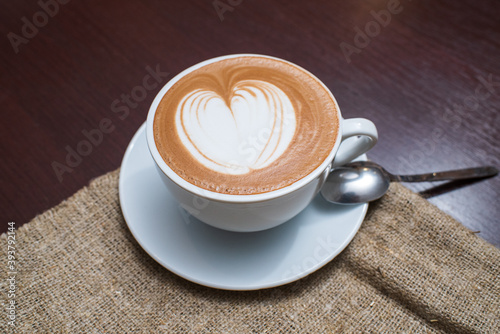 Delicious, aromatic and freshly made cappuccino with a pattern