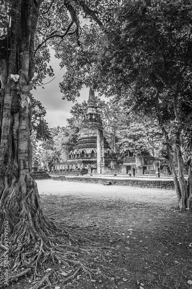 Landmark of old chedi made of ancient bricks in the Kamphaeng Phet Historical Park, Thailand. Black and white Landmark of old chedi made of ancient bricks in the Kamphaeng Phet Historical Park, Thailand. Black and white
