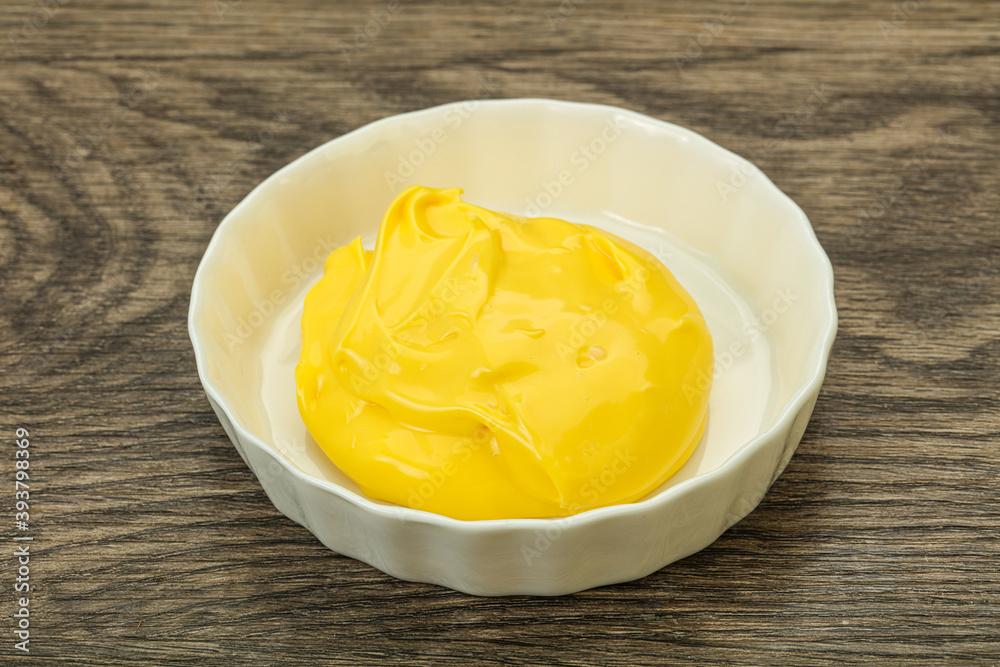 Natural cheese sauce in the bowl Natural cheese sauce in the bowl