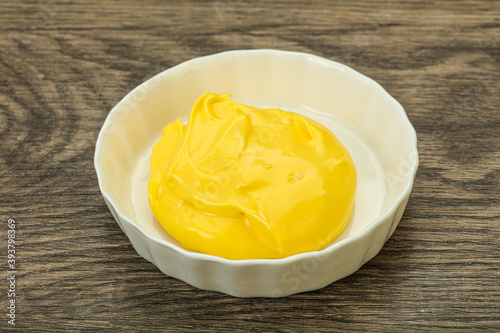 Natural cheese sauce in the bowl