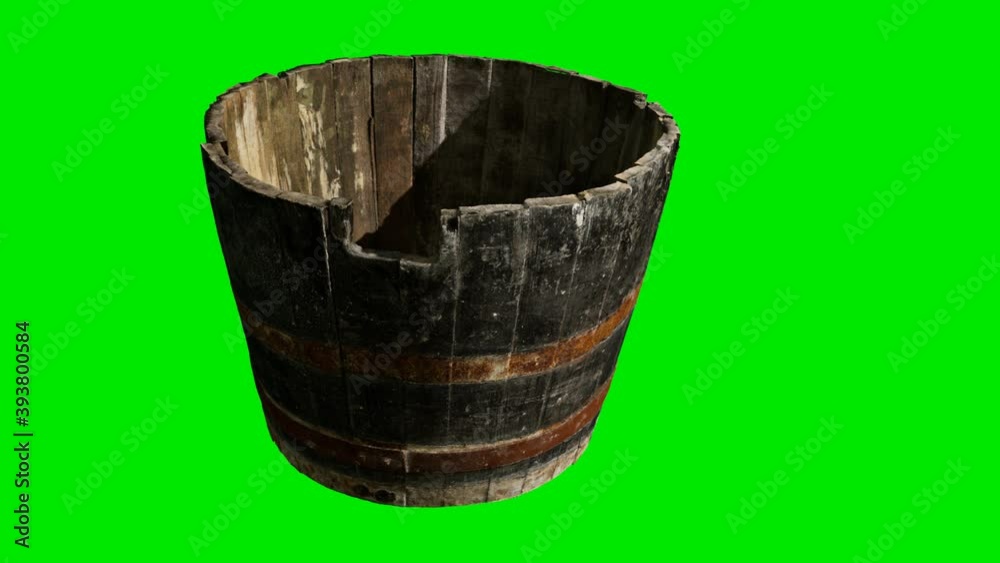 Old wooden pelvis on green chromakey background Old wooden pelvis on green chromakey background