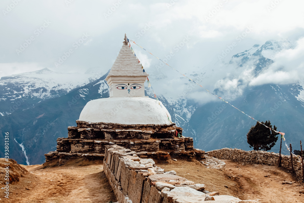 Beautiful traditional white stone Stupa with Budda eyes in Himalayas, Nepal. 