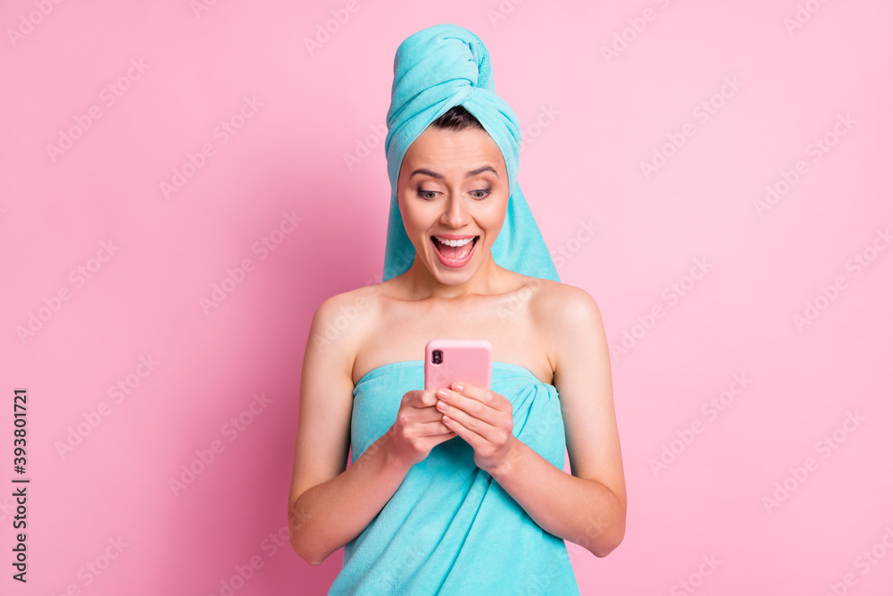 Portrait of cute pretty young lady writing telephone wear teal towels isolated on pink color background Portrait of cute pretty young lady writing telephone wear teal towels isolated on pink color background